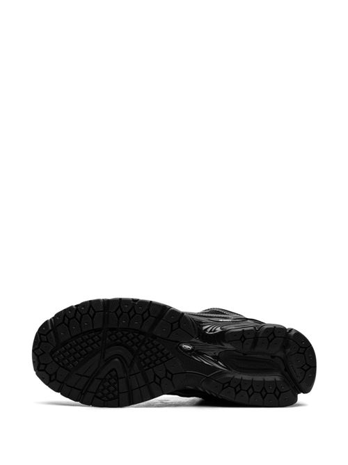 Sneaker nera di NEW BALANCE caratterizzata da logo laterale, suola segmentata e lacci. NEW BALANCE | M1906RCHBLACK